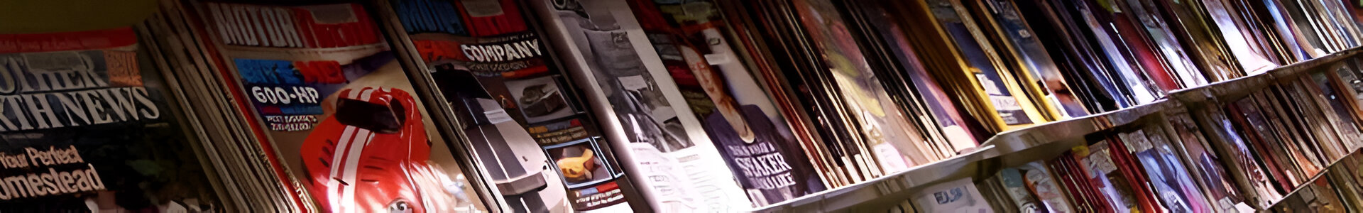 Rack of magazines, strecthing from near left to far right